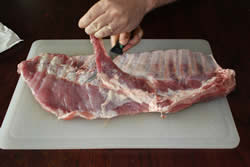 Remove flap of meat on spare ribs